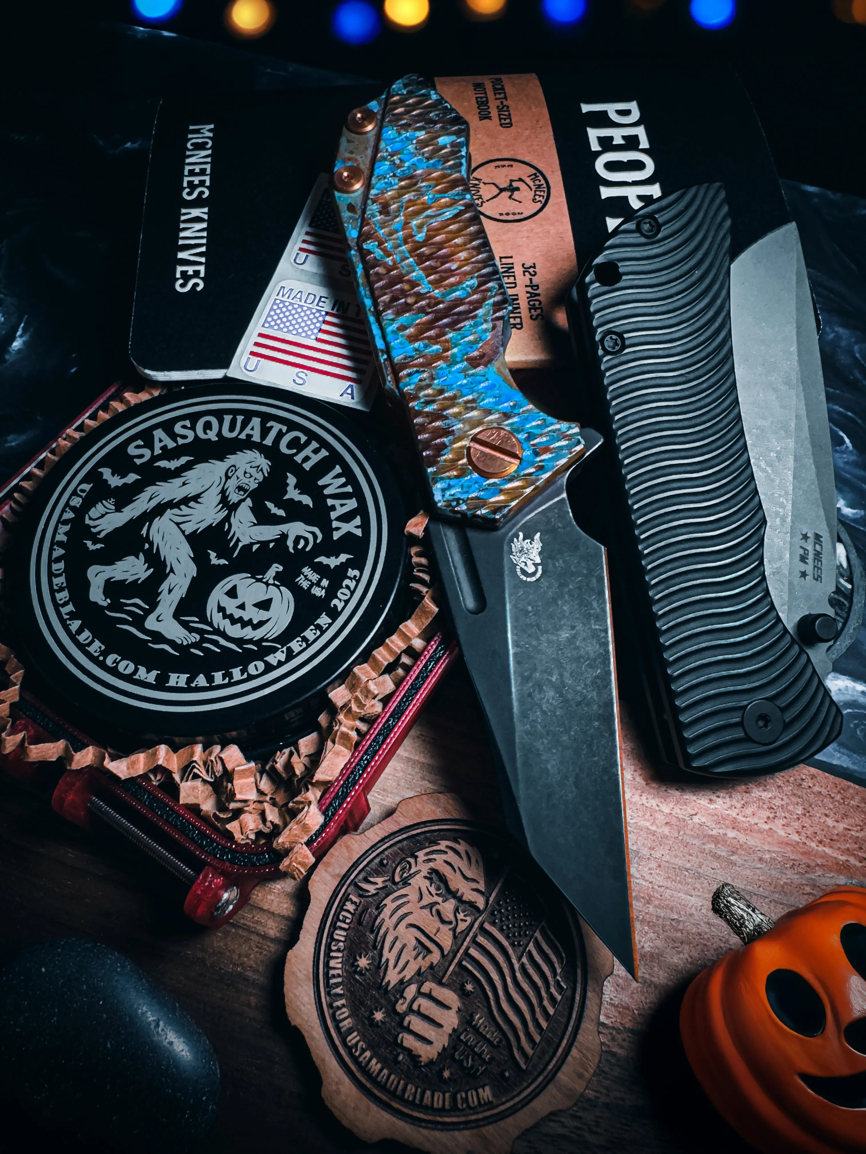 Bronze Spartan Blades Harsey V2 with sasquatch forest engraving beside the matching Squatch ring